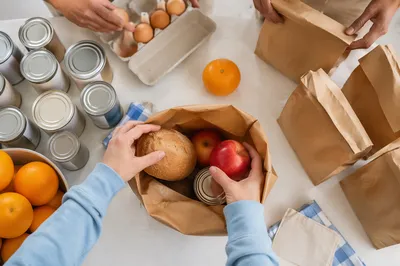 Church Volunteers Packing Food for Outreach