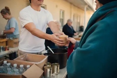 Church Hands Serving Food With Compassion