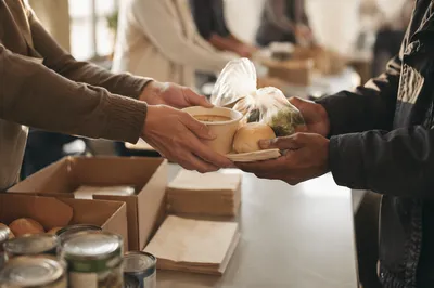 Church Volunteers Sharing Food with Compassion