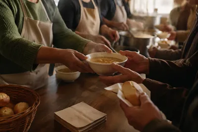 Church Outreach Hands Serving Warm Soup