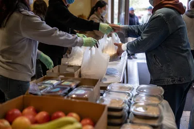 Church Outreach Hands Sharing Groceries