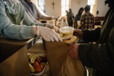 Church Volunteers Serving Warm Meals