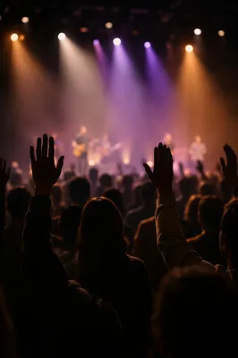Raised Hands in Worship Concert Lights