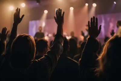 Raised Hands in Worship Concert Lights
