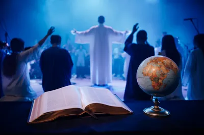 Open Bible and Globe for Missions Worship