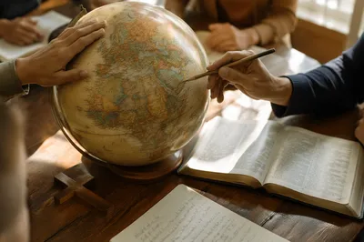 Missions Planning with Globe and Open Bible
