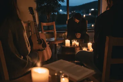Intimate Worship Room with Candles and Guitar