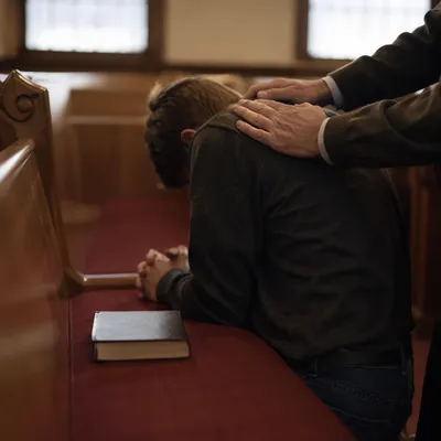 Laying Hands Prayer in Quiet Sanctuary