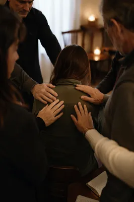 Laying Hands Prayer in Quiet Church Room