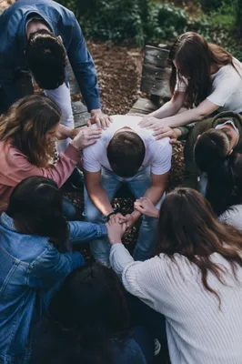 Youth Ministry Laying Hands Prayer Outdoors