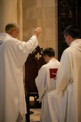 Reverent Laying Hands Prayer in Sanctuary