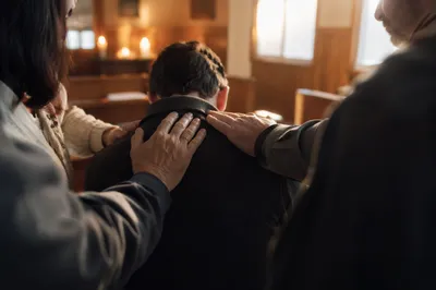 Laying Hands Prayer in Wooden Chapel