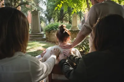 Laying Hands Prayer in Garden Courtyard