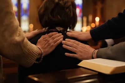 Laying Hands Prayer Ministry in Warm Church