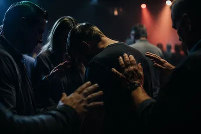 Laying Hands Prayer in Church Gathering