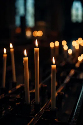 Memorial Candles Glowing in Quiet Church