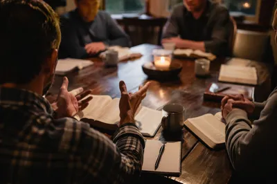 Men’s Bible Study Around Wooden Table