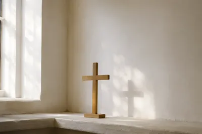 Minimal Wooden Cross on Chapel Ledge