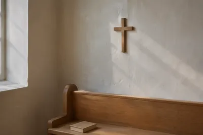 Minimal Wooden Cross on Chapel Wall