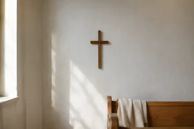 Minimalist Wooden Cross on Chapel Wall
