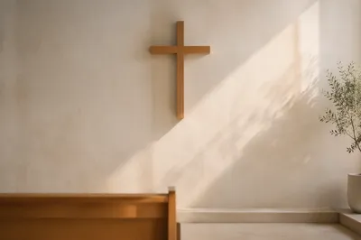 Minimalist Wooden Cross on Chapel Wall