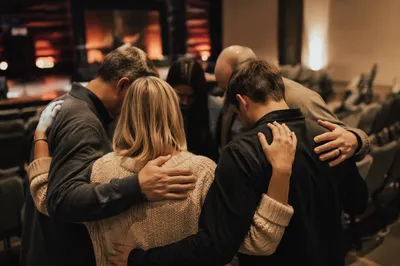 Ministry Leaders Praying Before Church Service