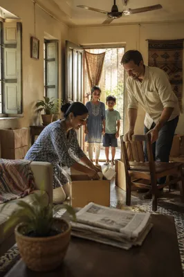 Family Unpacking in Sunlit Modest Home