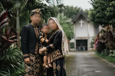 Diverse Missionary Family Outside Community Chapel