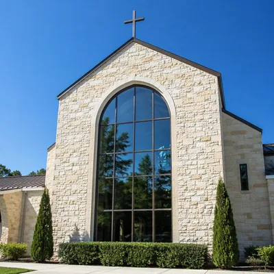 Modern Neighborhood Church Exterior Under Blue Sky