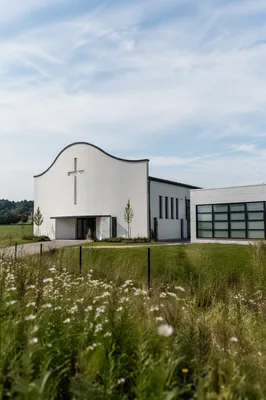 Modern Minimalist Church Exterior with Meadow