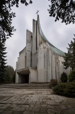 Modern Concrete Church in Wooded Silence