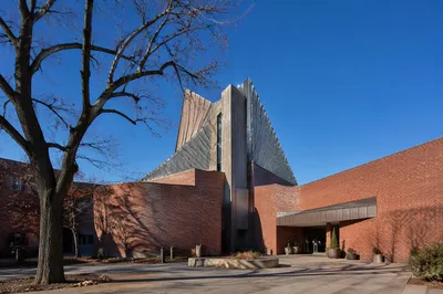 Modern Brick Church Exterior in Urban Courtyard