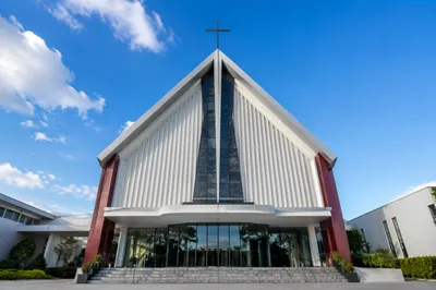 Modern Church Exterior Under Blue Sky