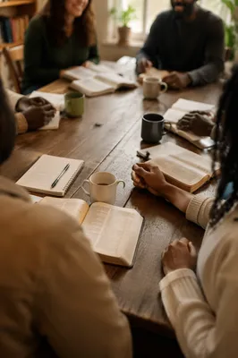 Multicultural Bible Study Around Wooden Table
