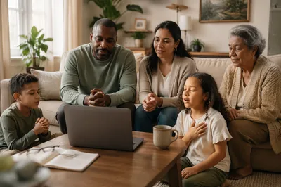 Family Gathered Around Laptop in Living Room