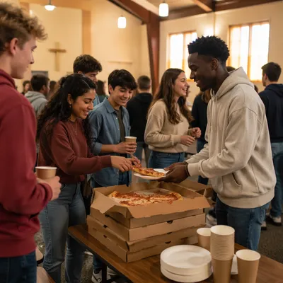 Youth Group Gathering with Stacked Pizza Boxes