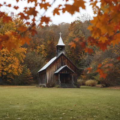 Rustic Wooden Chapel in Autumn Clearing