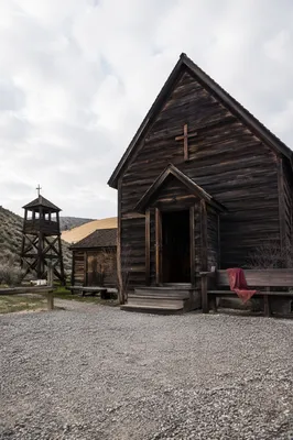 Rustic Countryside Wooden Chapel on Quiet Morning
