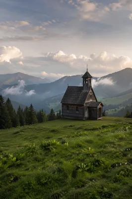 Small Wooden Chapel on Misty Countryside Hill