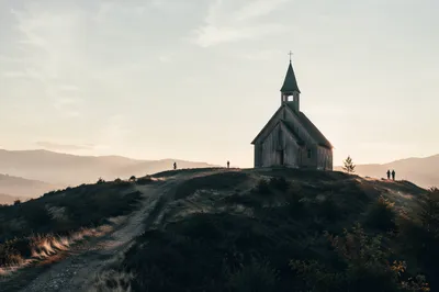 Small Wooden Chapel on Countryside Hill