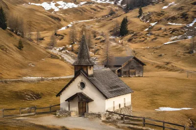 Small Wooden Chapel in Winter Countryside