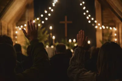 Worship Gathering with Cross and Bokeh