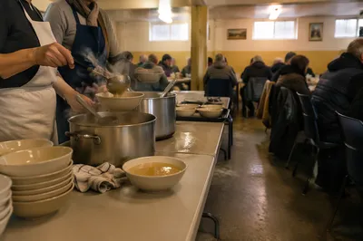Church Soup Kitchen Volunteers Serving Warm Meals