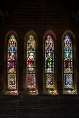 Colorful Stained Glass Windows in Quiet Church