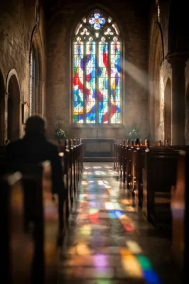 Colorful Stained Glass Light in Stone Church