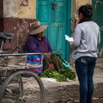 Compassionate Street Evangelism Conversation Near Storefront