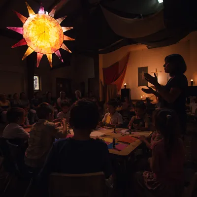 Sunday School Children Crafting Under Lantern Light