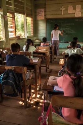 Volunteer Teaching English in Mission Classroom