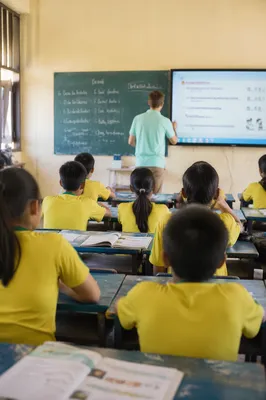 Volunteer Teaching English in Mission Classroom