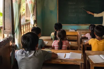 Volunteer Teaching English in Mission Classroom